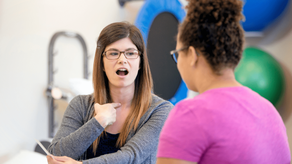 Two women in a speech therapy session.