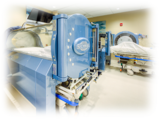 Hyperbaric chamber in medical treatment room.