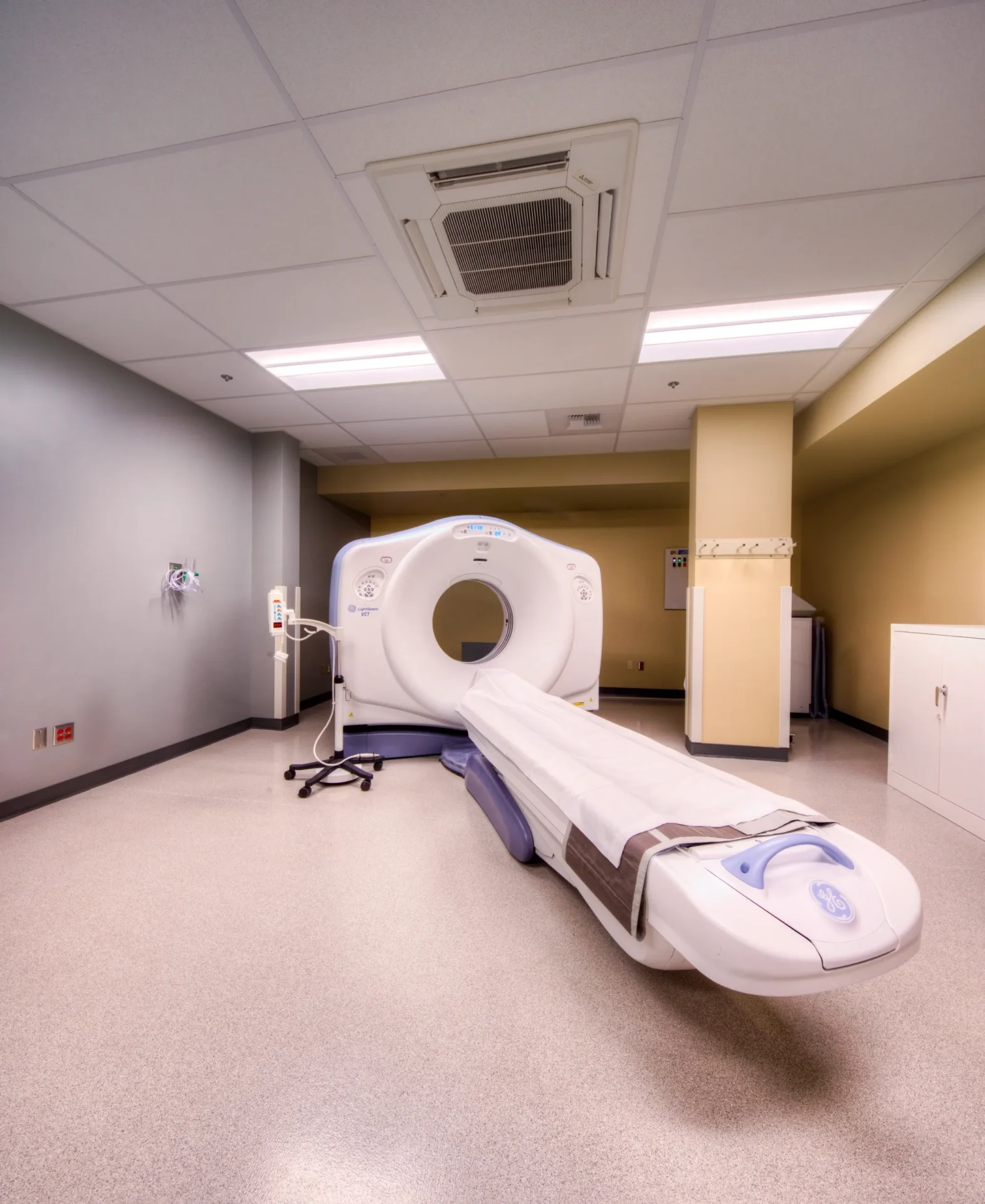 Empty CT scanner in medical imaging room